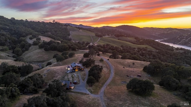 aerial view at dusk with a mountain view