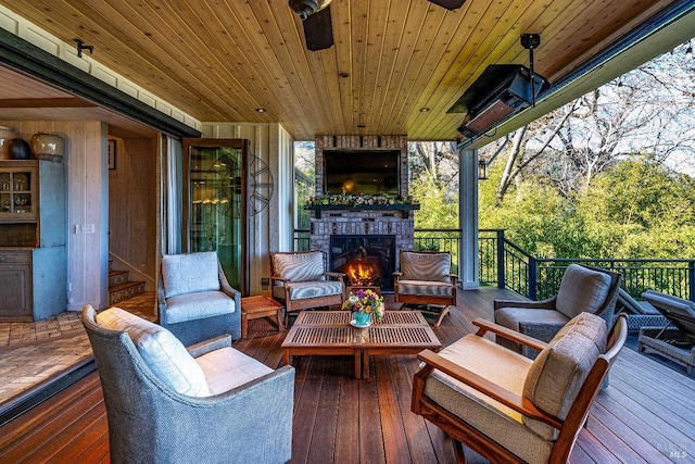 wooden terrace featuring outdoor lounge area