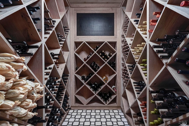 wine room with tile patterned floors