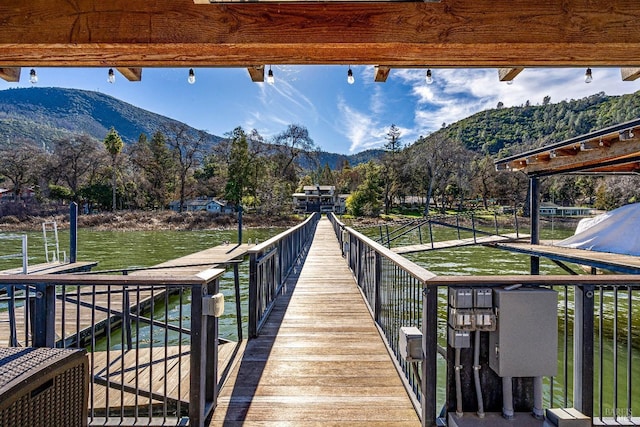 dock area featuring a mountain view