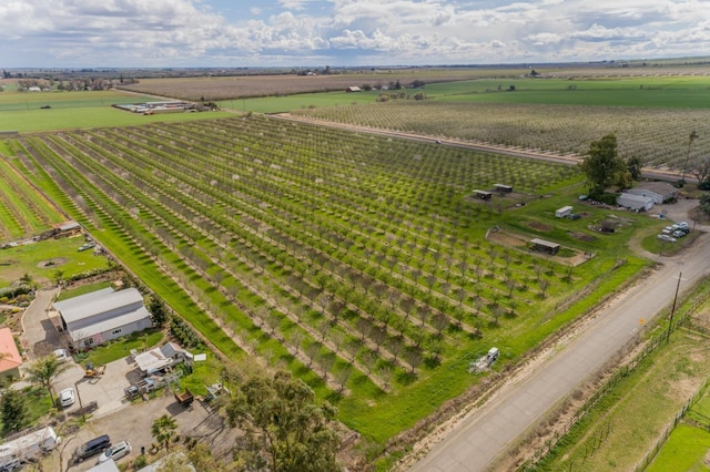 birds eye view of property featuring a rural view