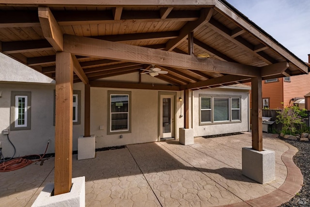 view of patio featuring fence