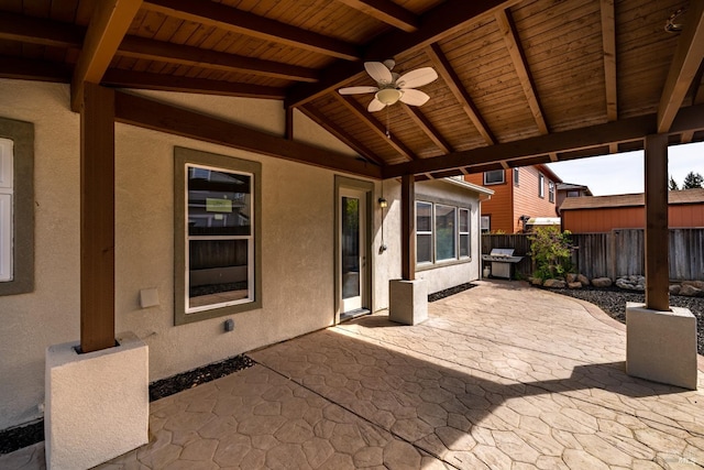 view of patio with fence and area for grilling