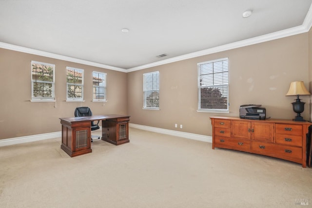 home office with light carpet, baseboards, visible vents, and crown molding