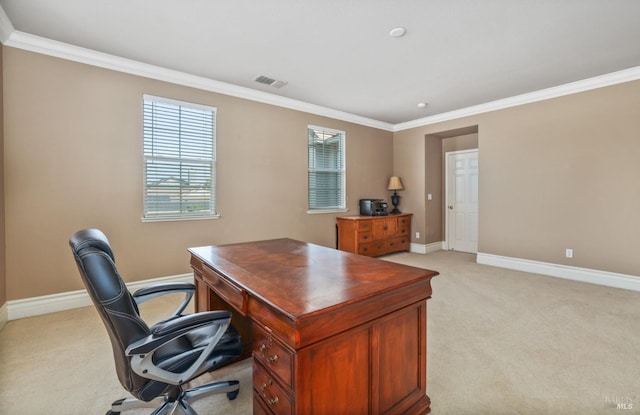 home office with ornamental molding, light carpet, visible vents, and baseboards