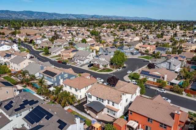 aerial view with a mountain view and a residential view