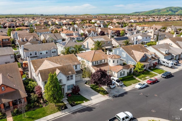 aerial view with a residential view and a mountain view
