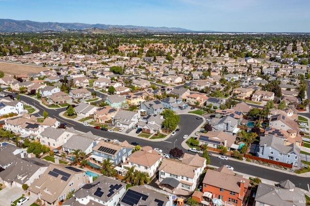 aerial view featuring a residential view and a mountain view