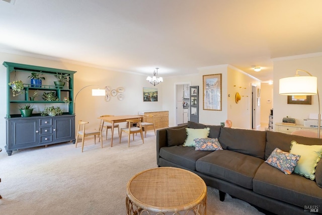 living area with crown molding, a notable chandelier, and light colored carpet