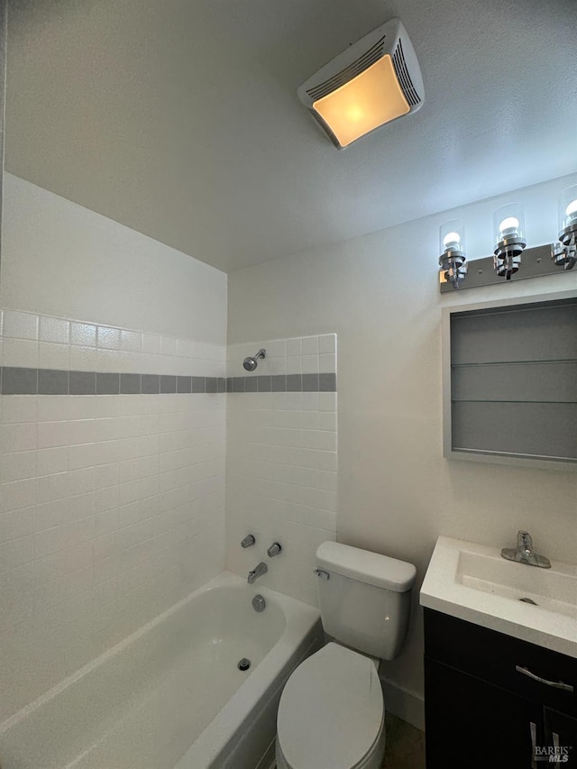 full bath featuring washtub / shower combination, visible vents, vanity, and toilet