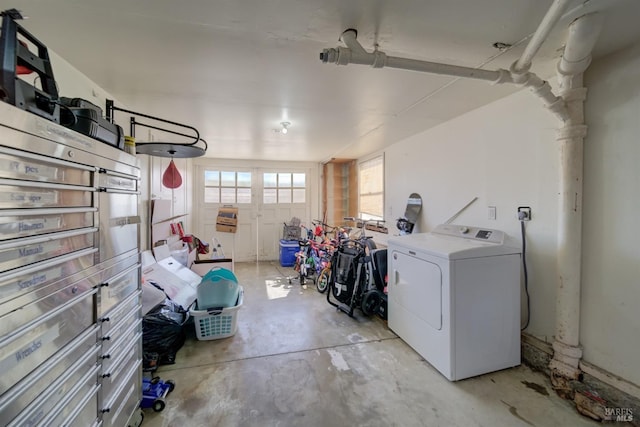 laundry room featuring washer / dryer and laundry area