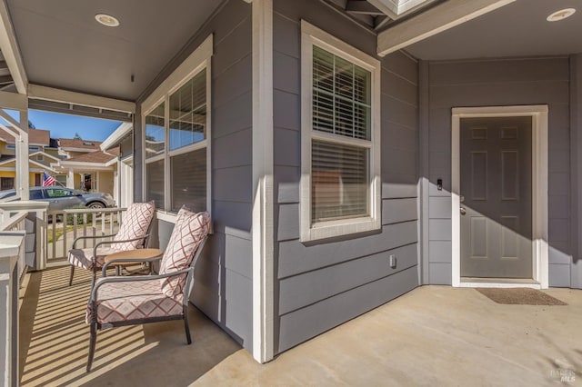 doorway to property with a porch