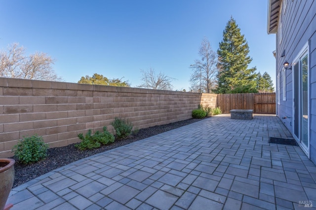 view of patio with a fenced backyard