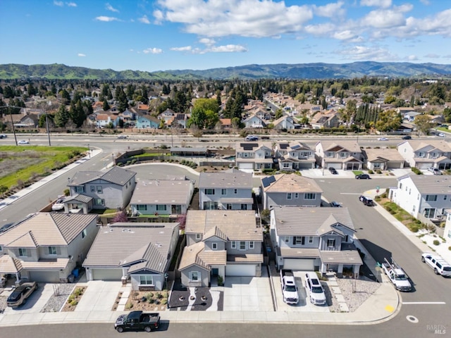 bird's eye view featuring a residential view and a mountain view