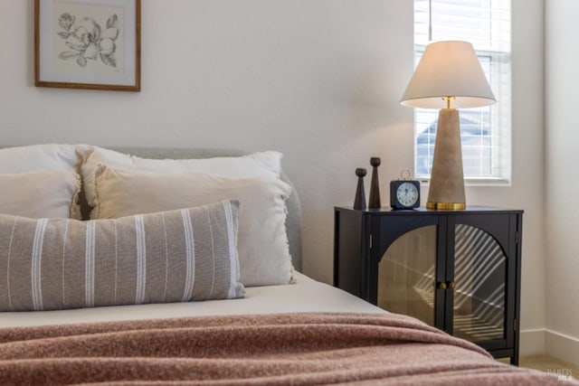 bedroom featuring multiple windows