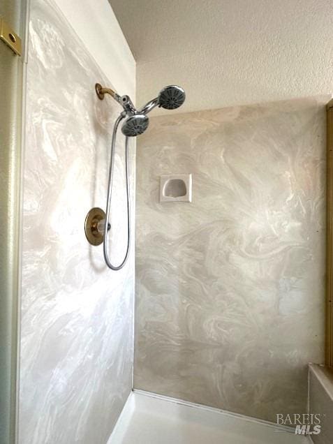 interior details with a shower