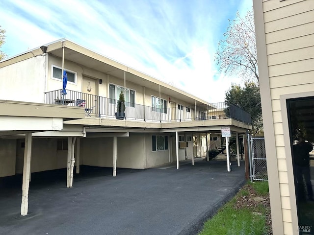 exterior space featuring driveway and a carport