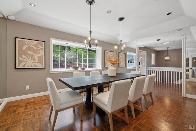 dining room with recessed lighting and baseboards