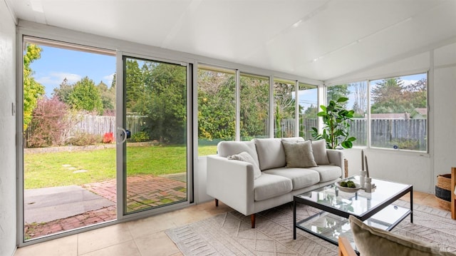 sunroom / solarium with vaulted ceiling