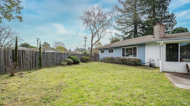 view of yard featuring a fenced backyard