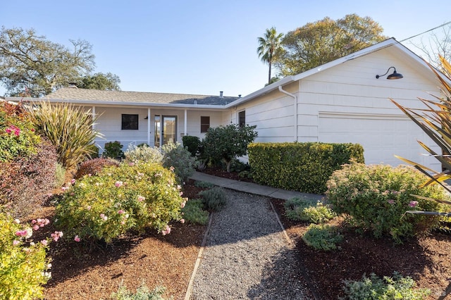 ranch-style home with an attached garage