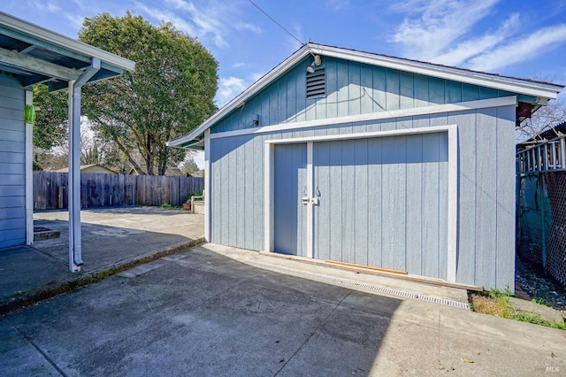 view of shed with a fenced backyard