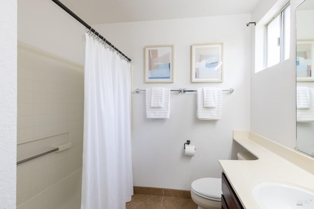 bathroom featuring baseboards, toilet, curtained shower, tile patterned flooring, and vanity