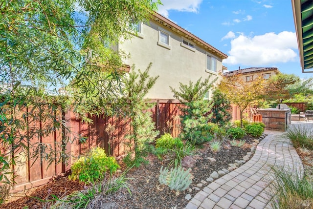 view of yard with fence