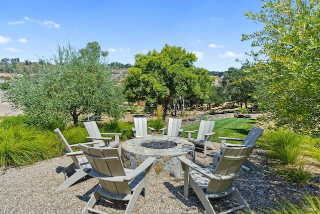 view of patio featuring an outdoor fire pit