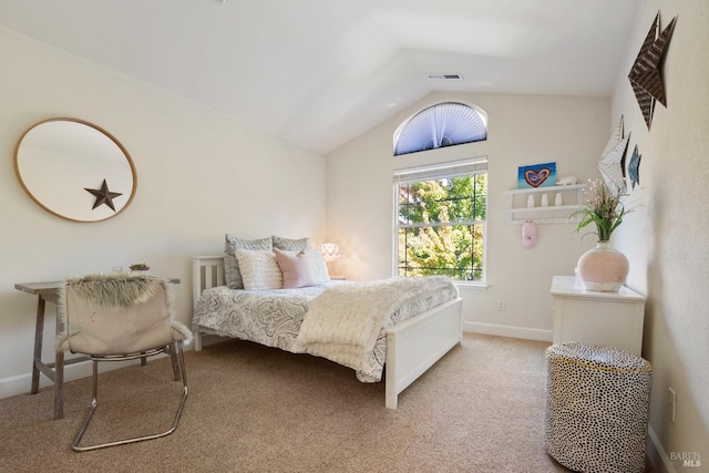 carpeted bedroom with visible vents, vaulted ceiling, and baseboards