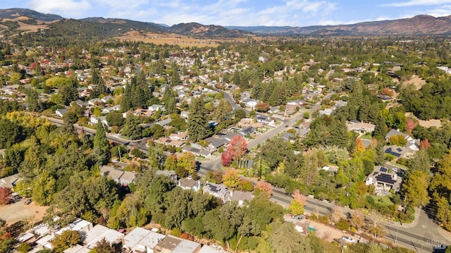 bird's eye view featuring a residential view and a mountain view