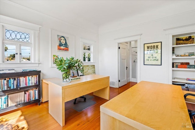 office space featuring light wood-style floors