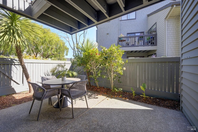 view of patio / terrace featuring outdoor dining space and a fenced backyard