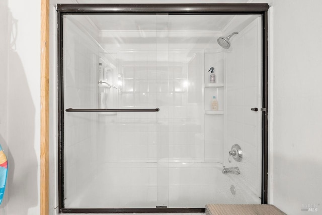 full bath with a shower with door