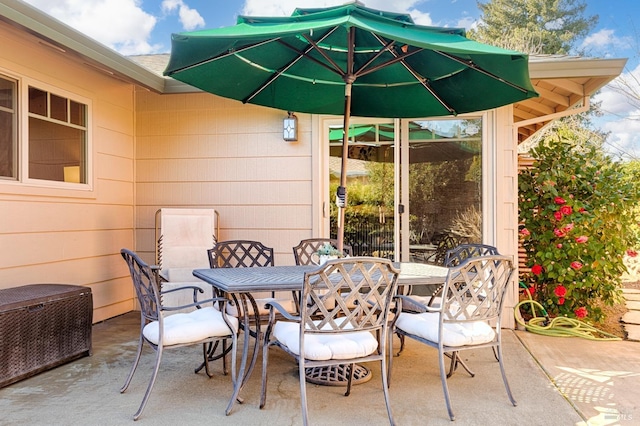 view of patio featuring outdoor dining space