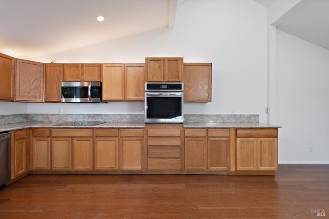 kitchen with dark wood-style flooring, brown cabinets, stainless steel appliances, light stone countertops, and high vaulted ceiling