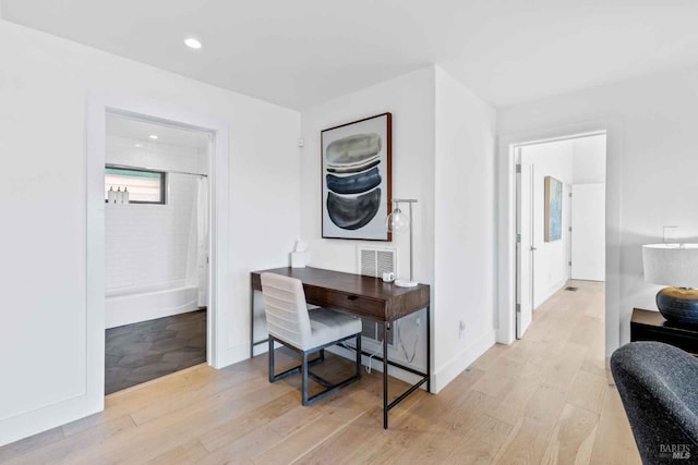 office area featuring recessed lighting, visible vents, and light wood-style flooring