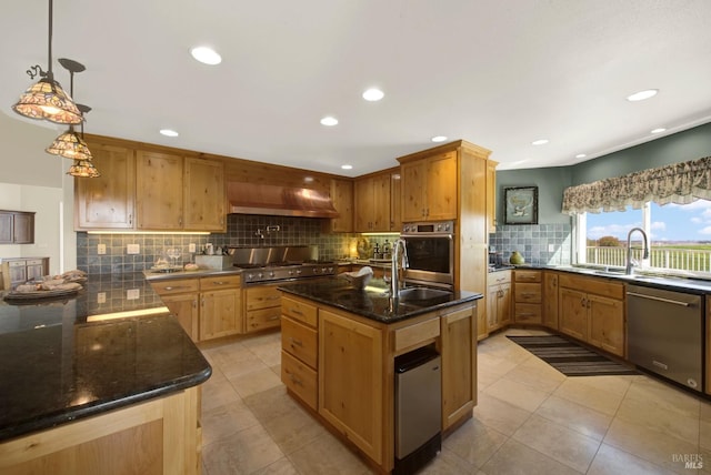 kitchen featuring recessed lighting, appliances with stainless steel finishes, backsplash, dark stone counters, and decorative light fixtures