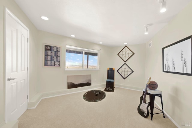 sitting room featuring baseboards, visible vents, carpet flooring, and recessed lighting