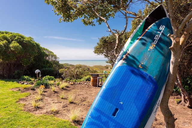 exterior space with a water view