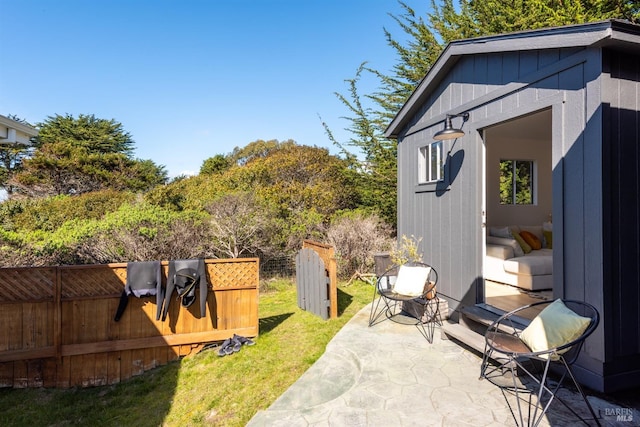 exterior space with a patio area and fence