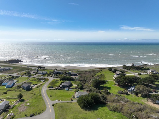 drone / aerial view with a view of the beach and a water view