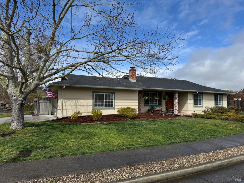 2501 Brookhaven Dr, Santa Rosa, CA 95405 - ranch-style home with a front yard, fence, and a chimney