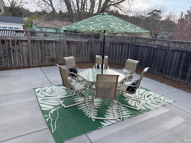 view of patio with fence private yard and outdoor dining area