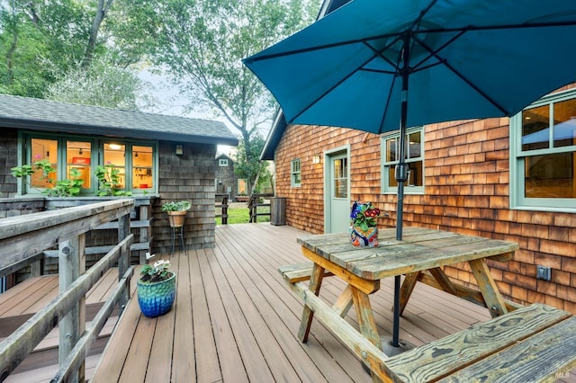 deck with outdoor dining space