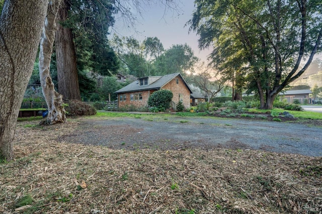 view of front of home with brick siding