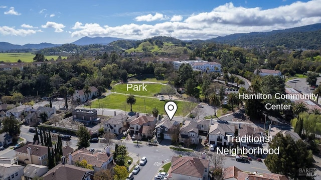 drone / aerial view with a residential view and a mountain view