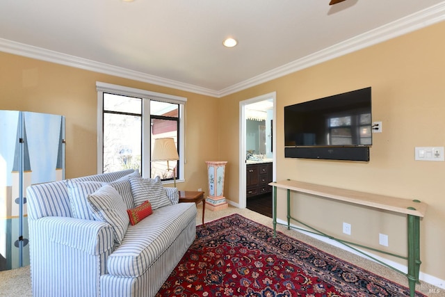 living area with carpet floors, baseboards, and ornamental molding