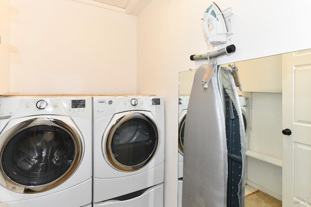 laundry area featuring laundry area and independent washer and dryer