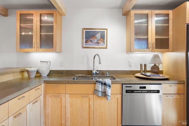 kitchen featuring dishwasher, a sink, glass insert cabinets, and light brown cabinets